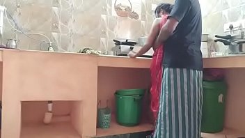 man and wife having sex in the kitchen